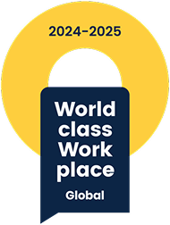 Badge with the text "World-class Workplace Global 2024–2025" in a blue ribbon over a yellow circular background.